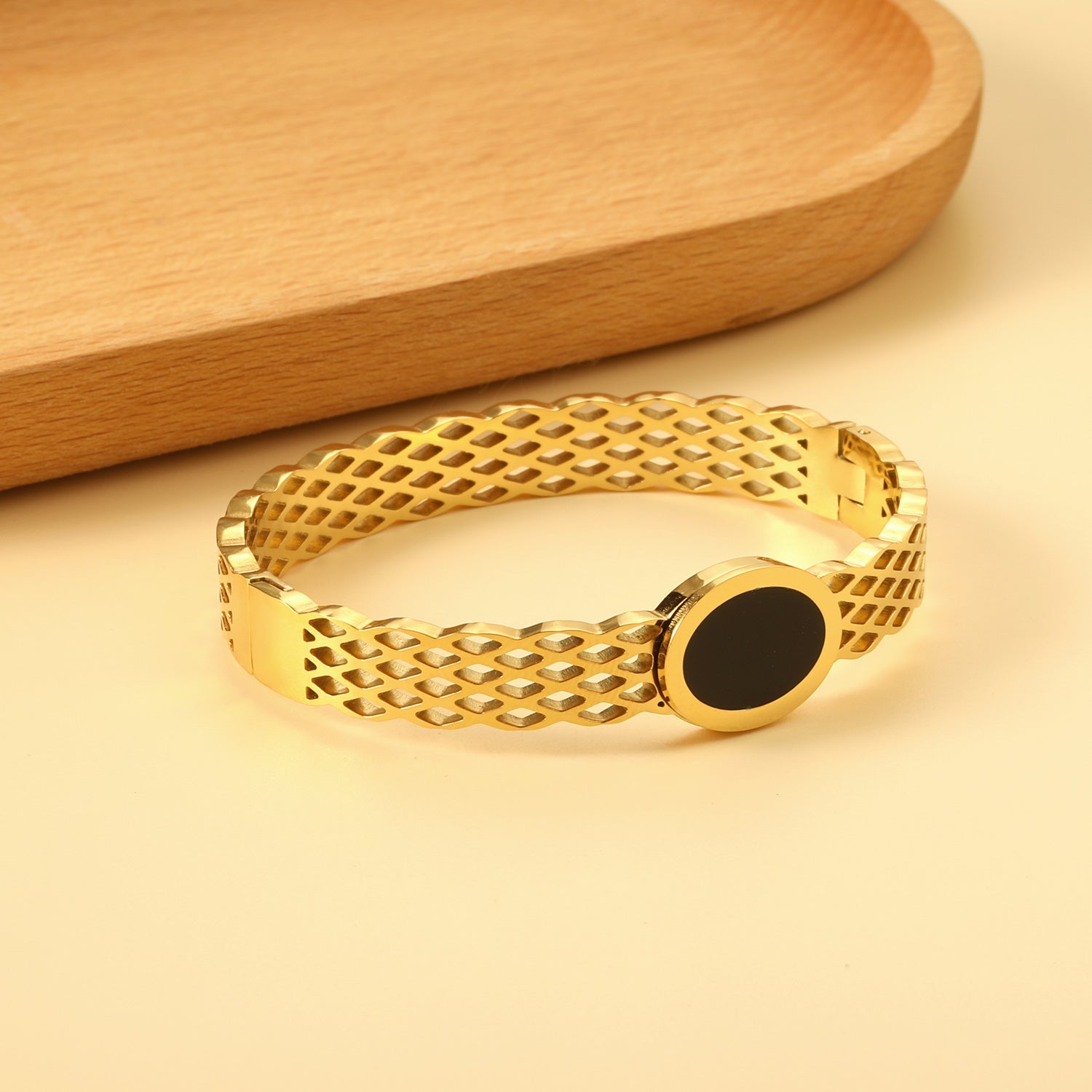 Gold Lattice Bangle with Black Oval Accent