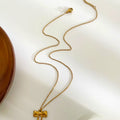 Gold Bow Pendant Necklace
