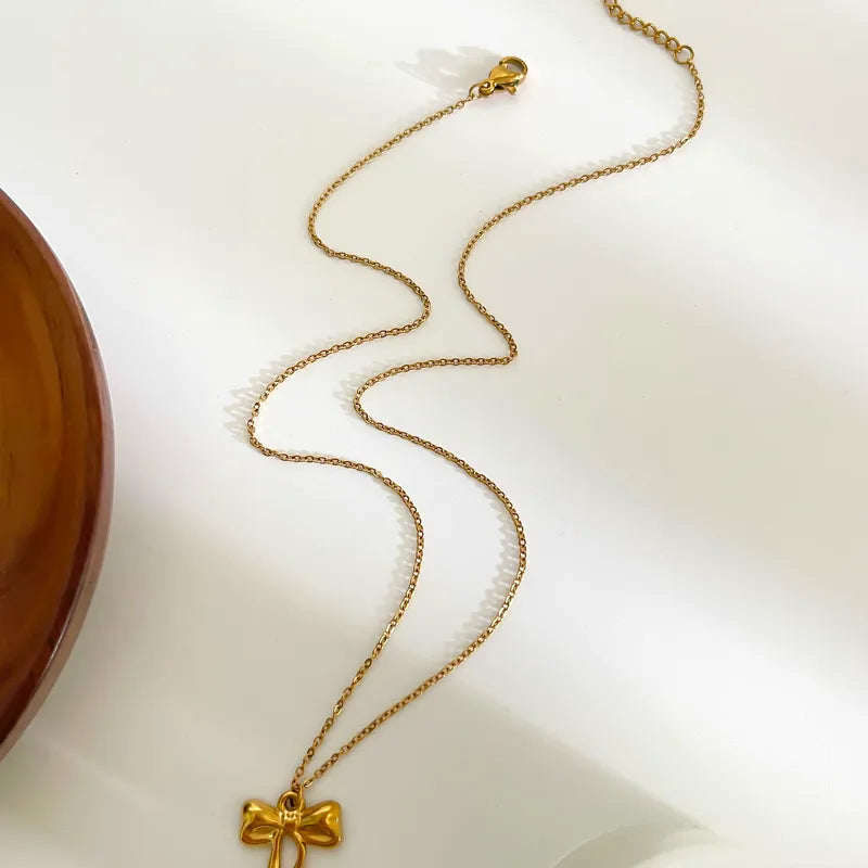 Gold Bow Pendant Necklace
